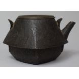 An Oriental Bronze Teapot of Shaped Slanted Squat Form with Shallow Ivy Leaf Decorated In Relief