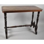 A Late Victorian/Edwardian Rectangular Topped Occasional Table on Turned Support and Stretcher, 89cm