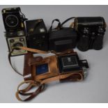 A Collection of Vintage Cameras and Pair of Binoculars