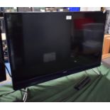 A Samsung 32" TV with Remote