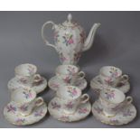 A Grosvenor Bouquet Pattern Coffee Set to comprise Coffee Pot, Six Cans and Six Saucers