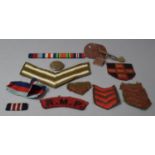 A Small Collection of Militaria to Include Dog Tags, Cloth Badges, Medal Bar etc