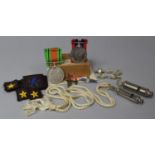 A Small Collection of Militaria to Include Two WWII Medal, Cloth Badges, Two Whistles, Star Pips,