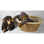 A Wicker Basket Containing Ape and Chimpanzee Soft Toys, Basket 53cm wide