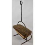 A Large Wrought Iron Framed Country House Boot Cleaning Brush with Barley Twist Carrying Handle,