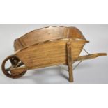 An Early/Mid 20th Century Wooden Planter In the Form of a Wheelbarrow, 40cm Long