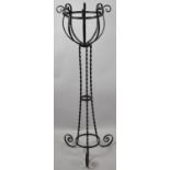 A Modern Wrought Iron Plant Stand on Barley Twist Tripod Support with Scroll Feet and Top