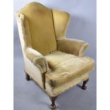 A Velvet Upholstered Wing Armchair for Restoration