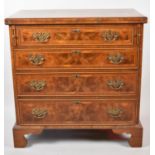 A Good Quality Reproduction Burr Walnut String Inlaid Chest of Four Graduated Drawers with Hinged