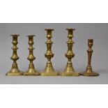 Two Pairs of Victorian Brass Candlesticks and a Single Example, Tallest 24cm high