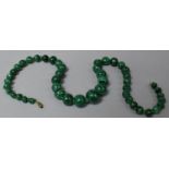 A String of Hand Cut Graduated Malachite Beads, Requires Restringing