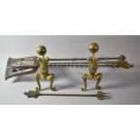 A Pair of Brass Fire Dogs Together with Long Handled Fire Irons and a Brass Toasting Fork, Poker