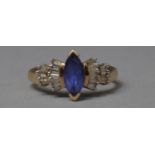 A 9ct Yellow Gold Tanzanite and Diamond Chip Dress Ring, Size O