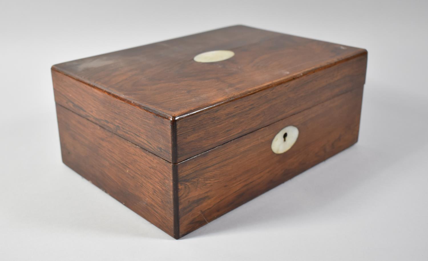 A Late 19th Century Rosewood Work Box with Oval Mother of Pearl Escutcheons, Missing Inner Tray