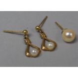A Pair of 9ct Gold and Pearl Stud Earrings Together with a Single Pearl Stud