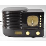 A Reproduction Bakelite Effect Art Deco Radio by Thomas, 31cm wide