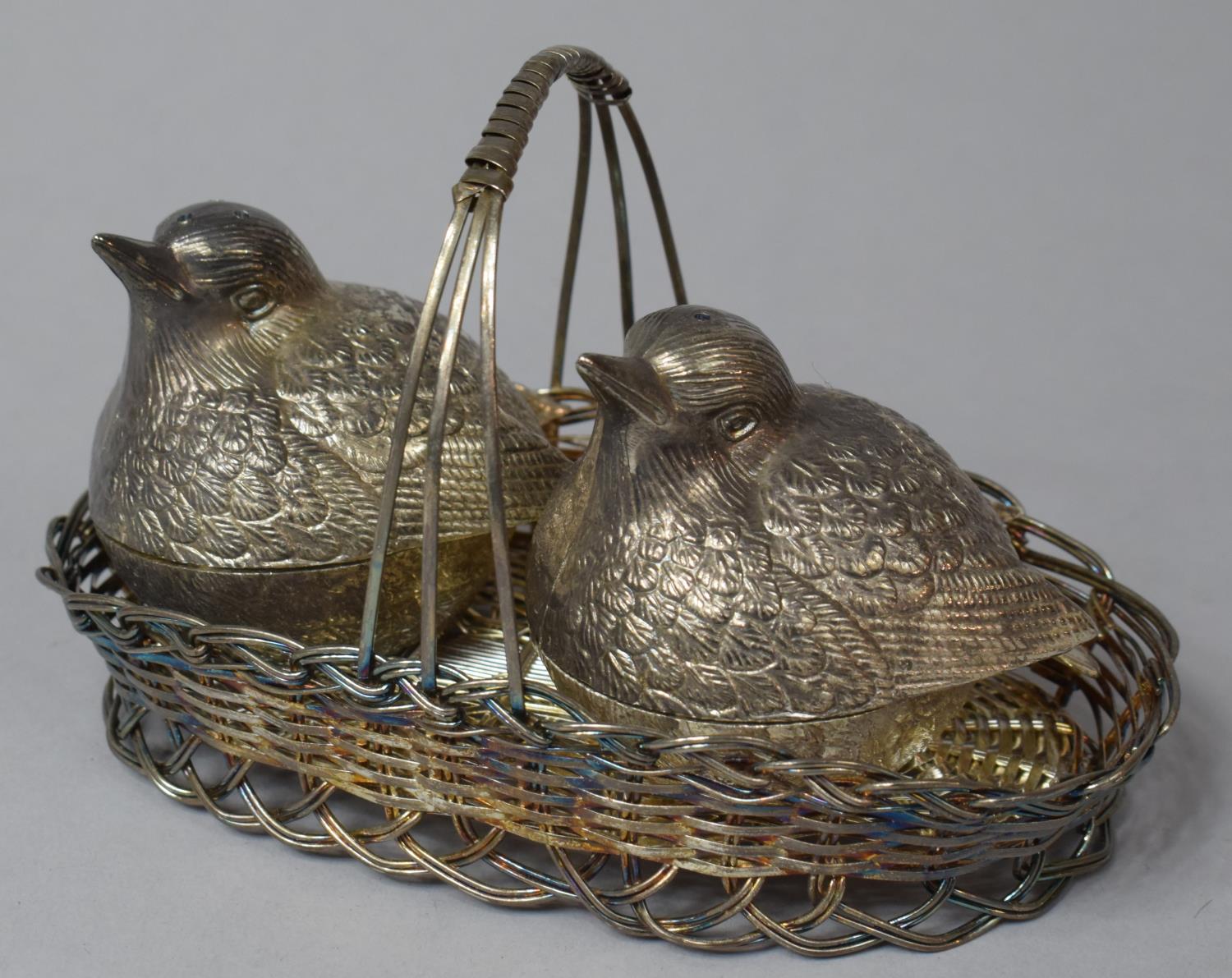 A Silver Plated Novelty Cruet in the Form of Two Chicks in a Basket, 16.5cm Long