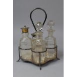 An Edwardian Silver Plate Mounted Four Bottle Cruet Set, 20.5cm high