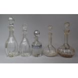 A Collection of Various Decanters to comprise Two Mallet Decanters and Two Globe and Stalk