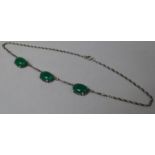 An Art Deco White Metal and Nephrite Three Stone Necklace