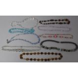 A Collection of Early 20th Century and Later Glass Bead Necklaces Plus a Pearl Example