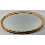 An Oval Gilt Framed Wall Mirror with Bevelled Glass, 64x44cm
