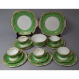 A Crown Staffordshire Green and Gilt Decorated Tea set to comprise Slop Bowl, Two Cake Plates,