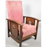 An Edwardian Oak Framed Reclining Armchair