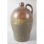 A 19th Century Salt Glazed Bellarmine Type Stoneware Flask, 45cm high