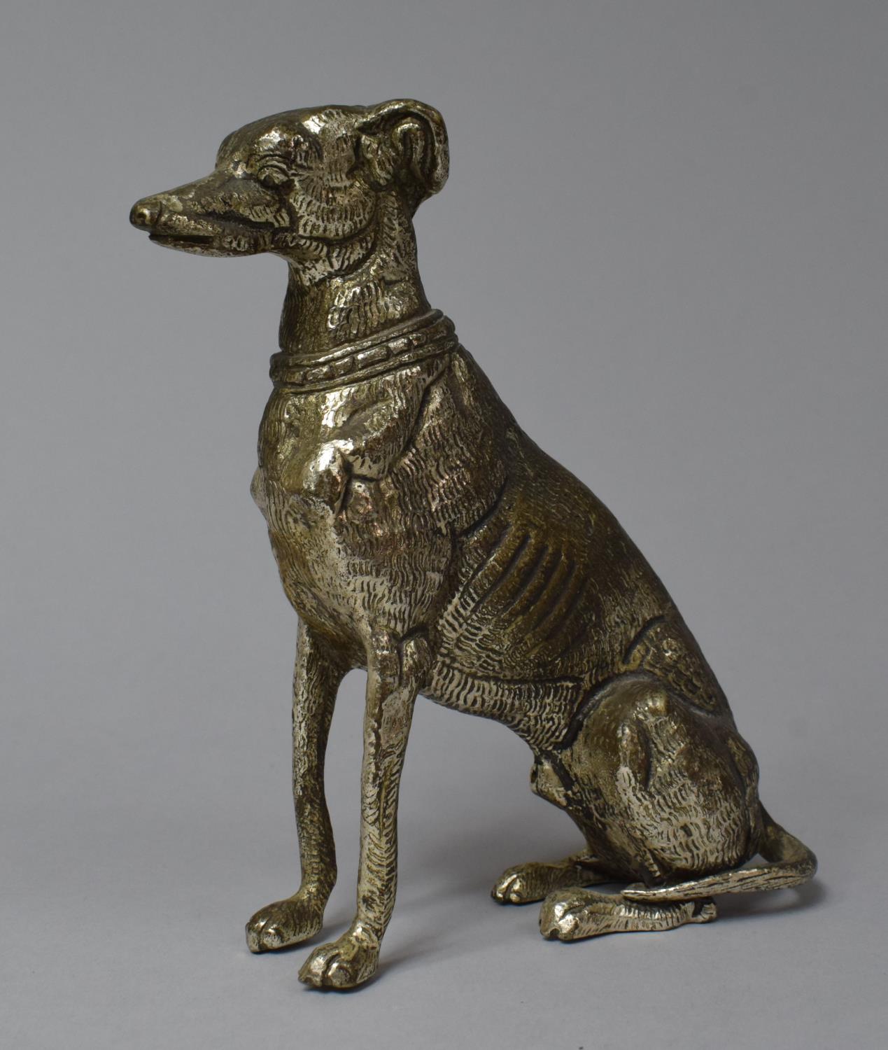 A Mid 20th Century Silver Plated Study of a Seated Greyhound, 15cm high