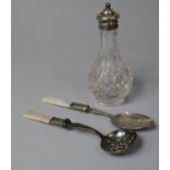 A Silver Topped Glass Pepper Pot and Two Plated Mother of Pearl Handled Preserve and Sifter Spoons