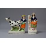 A Staffordshire Cow Creamer in the Form of Cow with Milkmaid ogether with a Flat Back Figure, (