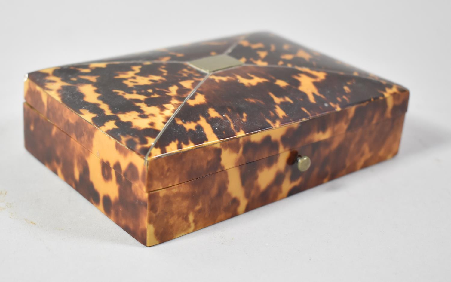 A Small Rectangular Cushioned Topped Tortoiseshell Box, Hinges Require Attention, 12cm wide