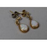 A Pair of 9ct Gold and Opal Drop Earrings