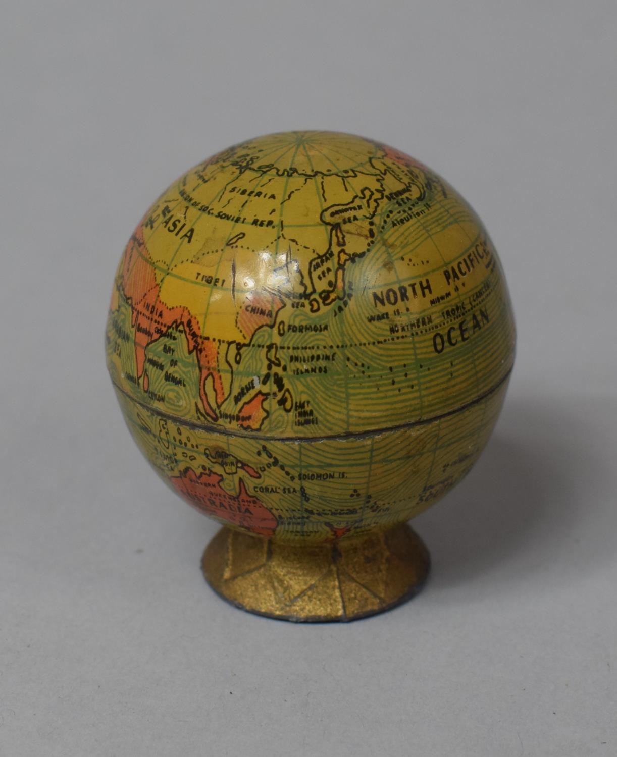 A Small Novelty Pencil Sharpener in the Form of a Globe, 5cm high