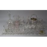 A Collection of Various Glassware to comprise Jugs, Lidded Biscuit Barrel, Globe and Stalk Decanter,