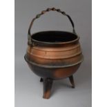 An Oxidised Metal Coal Bucket of Cauldron Form with Barley Twist Loop Handle, 35cm Diameter