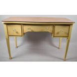 A Mid 20th Century Cream Serpentine Fronted Dressing Table or Writing Desk with Centre Long Drawer