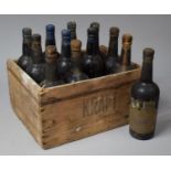 A Box Containing 12 Bottles of Harveys 1950's Sherry, Many with Missing Labels but One with 1953