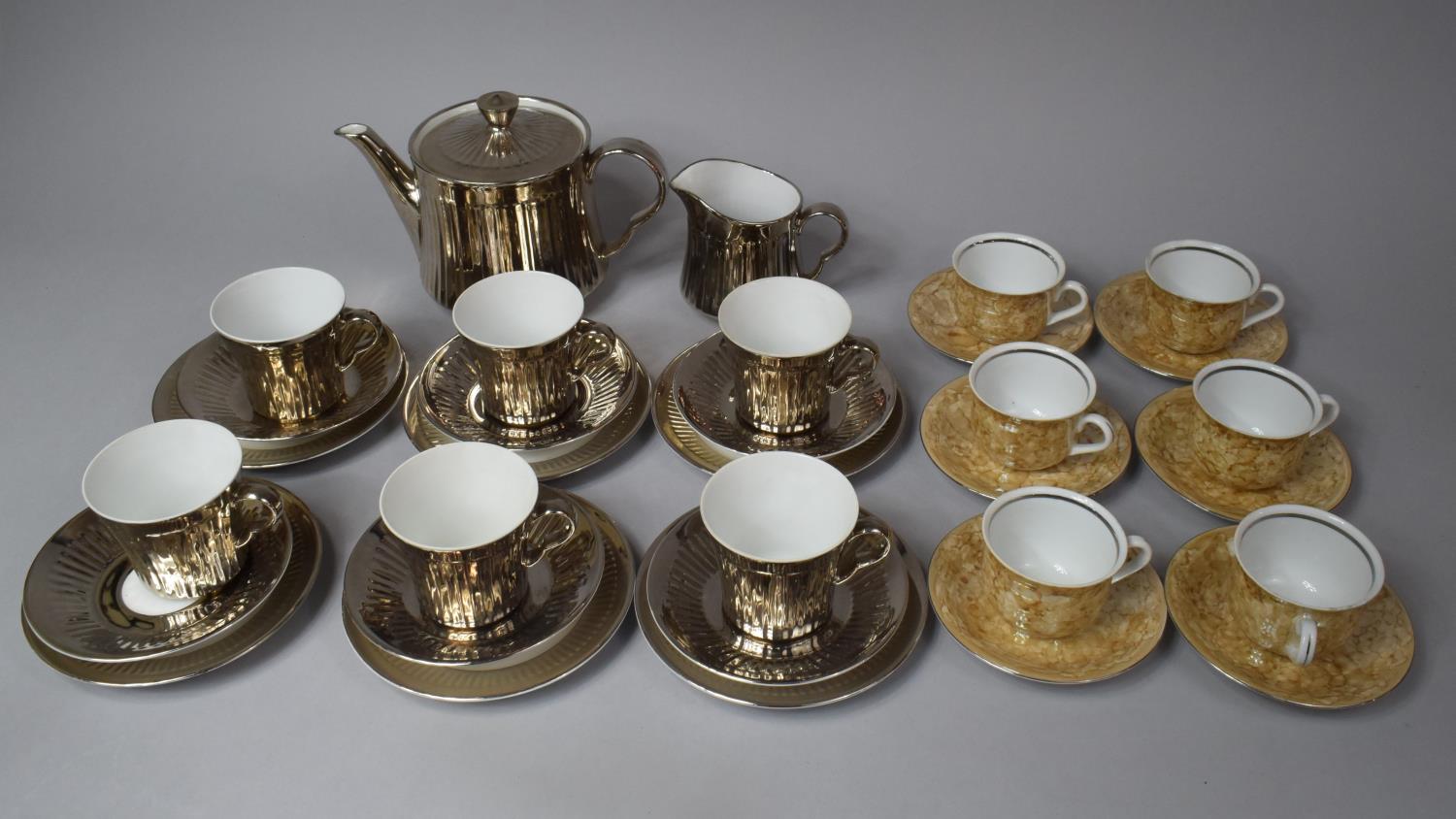 A Royal Worcester Lustre Teaset to comprise Teapot, Saucers, Side Plates, Cups together with a