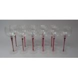A Set of Twisted Ruby Glass Stemmed Wines, 11 in Total