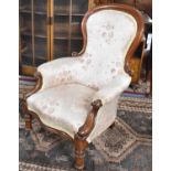 A Victorian Mahogany Framed Balloon Back Ladies Armchair with Serpentine Front, Scrolled Arms and