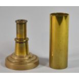 A Small Brass Cylinder and a Stepped Candlestick