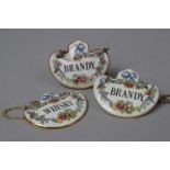 A Set of Three Ceramic Decanter Labels by Crown, 2x Brandy and 1x Whisky