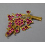 An Indian Yellow Metal and Ruby Brooch in the Form of a Spray of Flowers, 3.8g