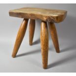 A Rustic Elm Topped Rectangular Four Legged Stool, 31cm wide