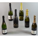 A Collection of Six Bottles of Sparkling Wines