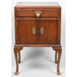 A Mahogany Side Cabinet with Top Drawer on Cabriole Supports, 48cm wide
