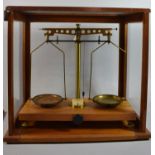 An Edwardian Mahogany Cased Set of Scientific Pan Scales, Case 43cm wide and 40cm High