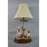 A Late 20th Century Capodimonte Figural Table Lamp, Children on Seesaw